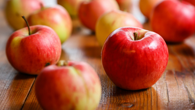 Red apples wooden table food free wallpaper for desktop - medium preview image