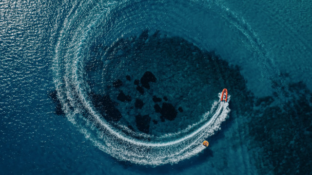 Boats rocks water cinematic aurora free wallpaper for desktop - medium preview image