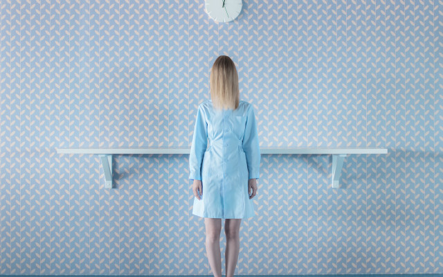 Woman clock wall blue coat free wallpaper for desktop - medium preview image