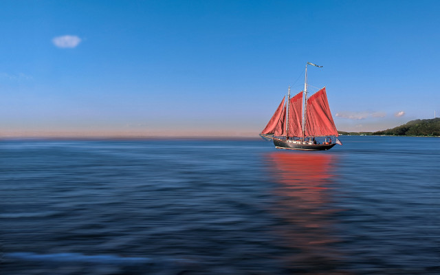 Sailboat water sky island photography free wallpaper for desktop - medium preview image