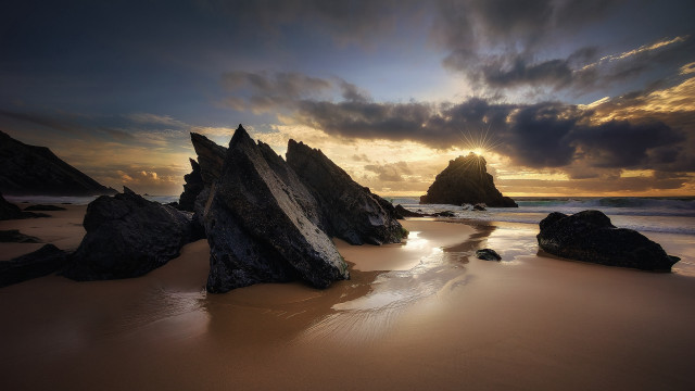 Beach rocks water sunset cloudy #3 free wallpaper for desktop - medium preview image