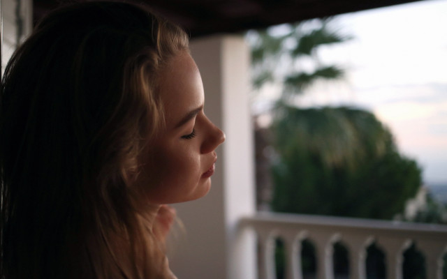 Woman ocean trees balcony shallow free wallpaper for desktop - medium preview image