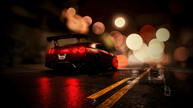 Red sports car night bokeh free wallpaper for desktop - medium preview image
