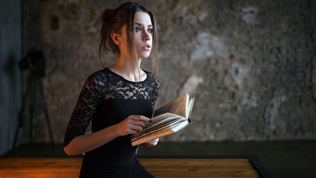 Woman black dress holding book #3 free wallpaper for desktop - medium preview image