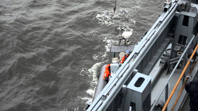 Boat crane water man standing free wallpaper for desktop - medium preview image