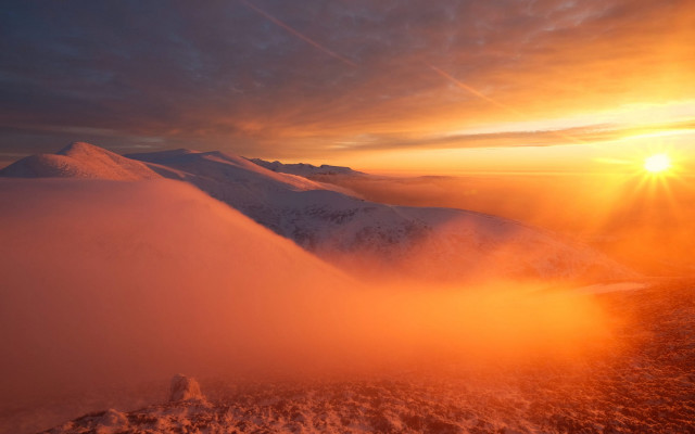 Sunset mountain dust cloud orange free wallpaper for desktop - medium preview image