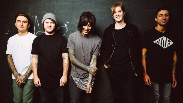 Young men black wall group free wallpaper for desktop - medium preview image