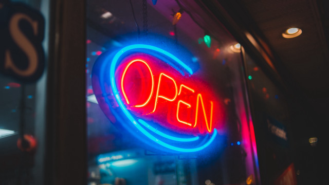 Neon open storefront restaurant city free wallpaper for desktop - medium preview image