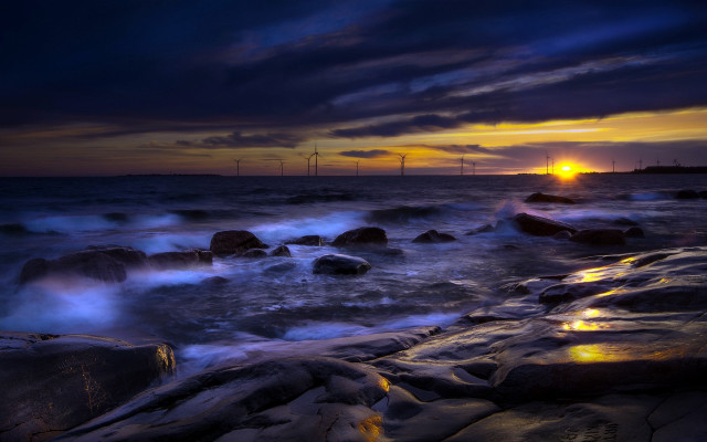Sunset ocean waves rocks windmills free wallpaper for desktop - medium preview image