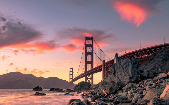 Bridge sunset rocky shore mountain free wallpaper for desktop - medium preview image