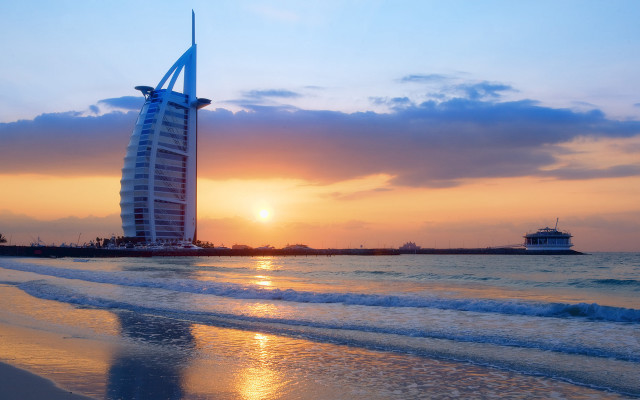 Tall building beach ocean sunset free wallpaper for desktop - medium preview image