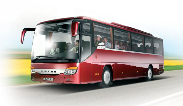 Red bus driving road people free wallpaper for desktop - medium preview image