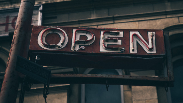 Open sign pole clock building free wallpaper for desktop - medium preview image