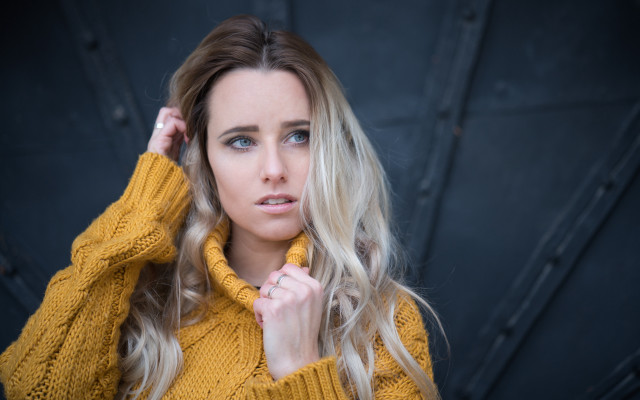 Blonde woman yellow sweater hands free wallpaper for desktop - medium preview image