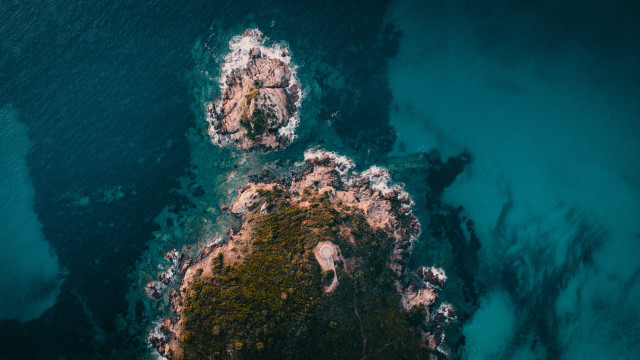 Boat rocky shore microscopic night free wallpaper for desktop - medium preview image