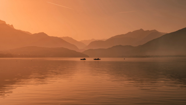 Boats lake sunset mountains clouds free wallpaper for desktop - medium preview image