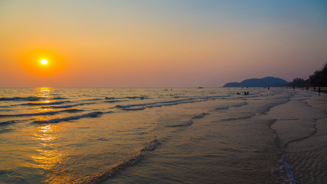 Beach waves sunset mountains matte free wallpaper for desktop - medium preview image