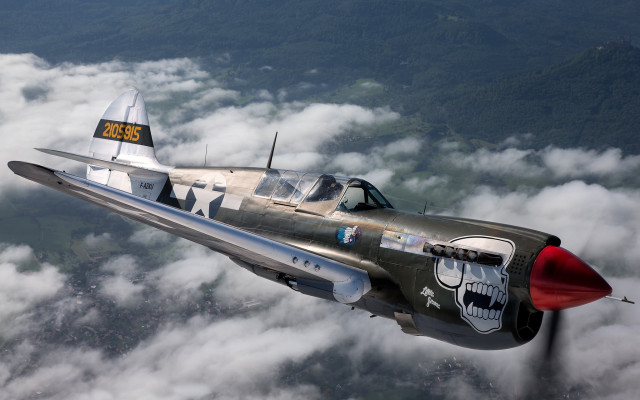 Fighter jet clouds mountains dieselpunk free wallpaper for desktop - medium preview image