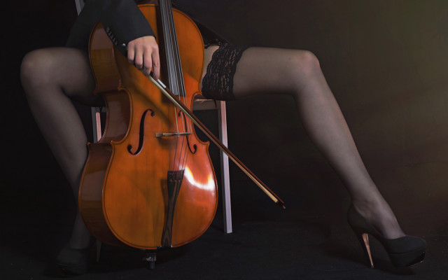Woman highheels cello sitting black free wallpaper for desktop - medium preview image