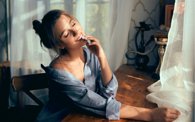 Woman sitting table toothbrush window free wallpaper for desktop - medium preview image