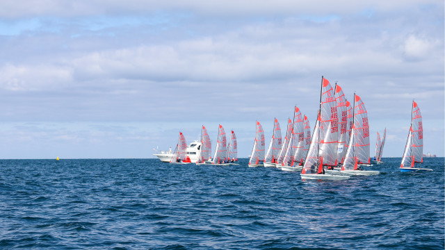 Sailboats ocean cloudy day vibrant free wallpaper for desktop - medium preview image