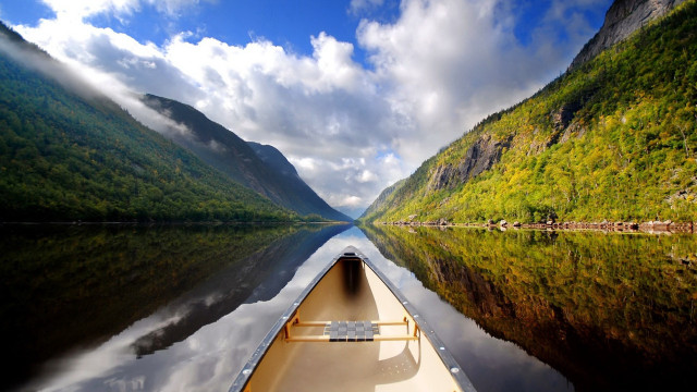 Tranquil boat river mountains clouds free wallpaper for desktop - medium preview image