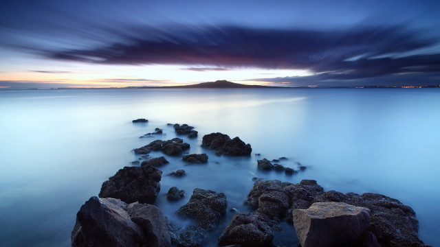 Rocky beach dusk mountain water free wallpaper for desktop - medium preview image