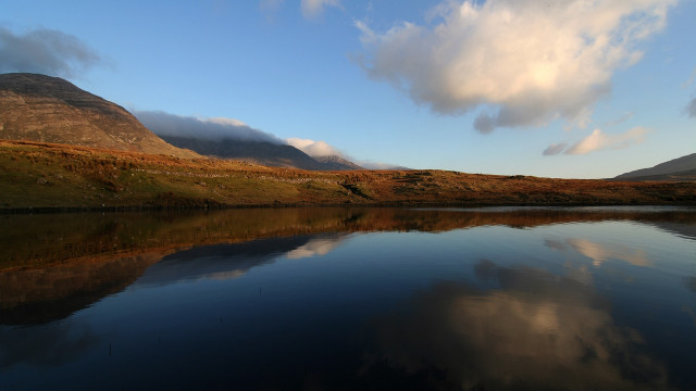 Lake mountains grass cloudy sky free wallpaper for desktop - medium preview image