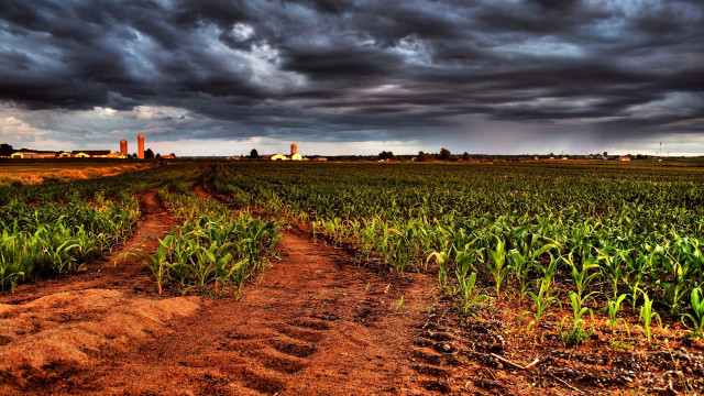 Stormy dirt road cityscape clouds #2 free wallpaper for desktop - medium preview image