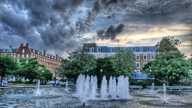 Fountain park cityscape stormy weather free wallpaper for desktop - medium preview image