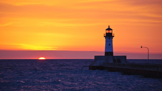 Lighthouse pier sunset water city free wallpaper for desktop - medium preview image
