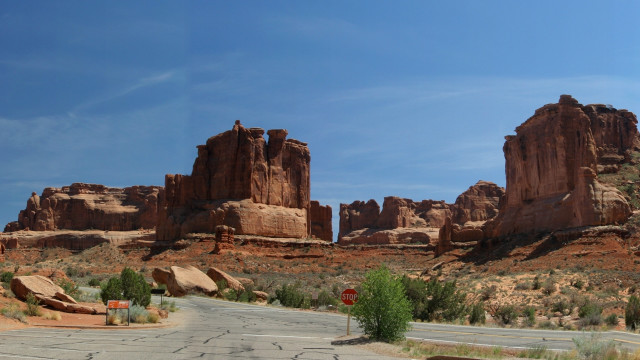 Desert road rock formation stop free wallpaper for desktop - medium preview image