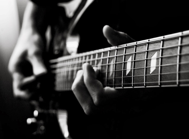 Person playing guitar fingers strings #2 free wallpaper for desktop - medium preview image