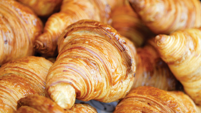 Croissants closeup table blurry background free wallpaper for desktop - medium preview image