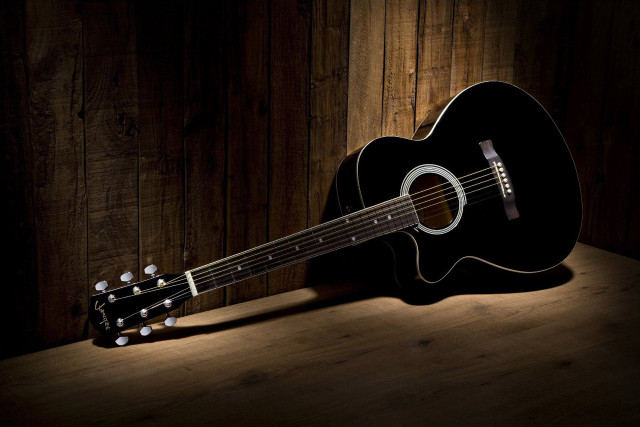 Guitar wooden table dark room free wallpaper for desktop - medium preview image