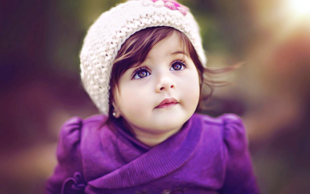 Little girl purple hat looking free wallpaper for desktop - medium preview image