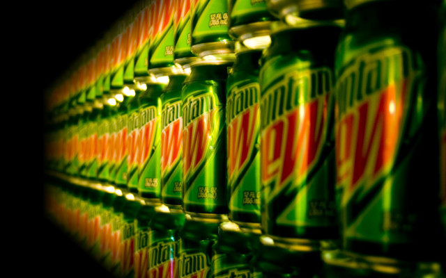 Soda cans closeup lights black free wallpaper for desktop - medium preview image