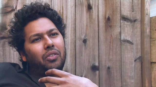 Curly hair man black shirt free wallpaper for desktop - medium preview image