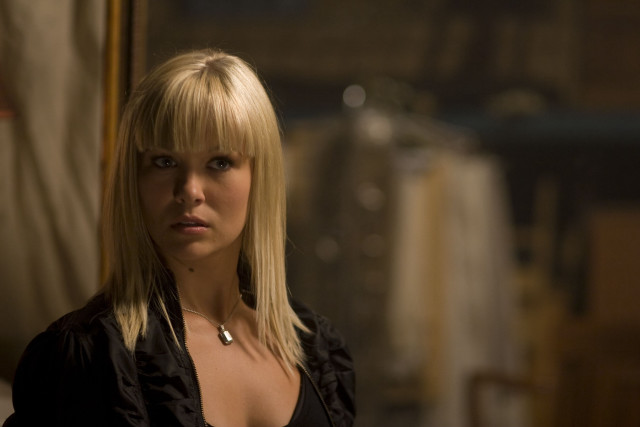 Blonde woman serious mirror camera free wallpaper for desktop - medium preview image