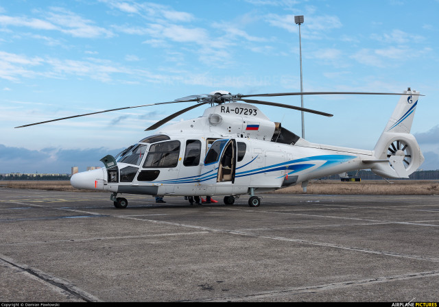 Helicopter parked tarmac airport sky free wallpaper for desktop - medium preview image
