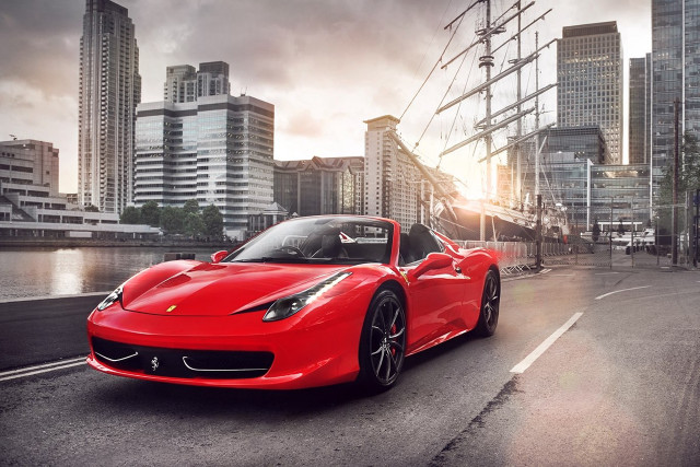 Red sports car cityscape bridge #2 free wallpaper for desktop - medium preview image