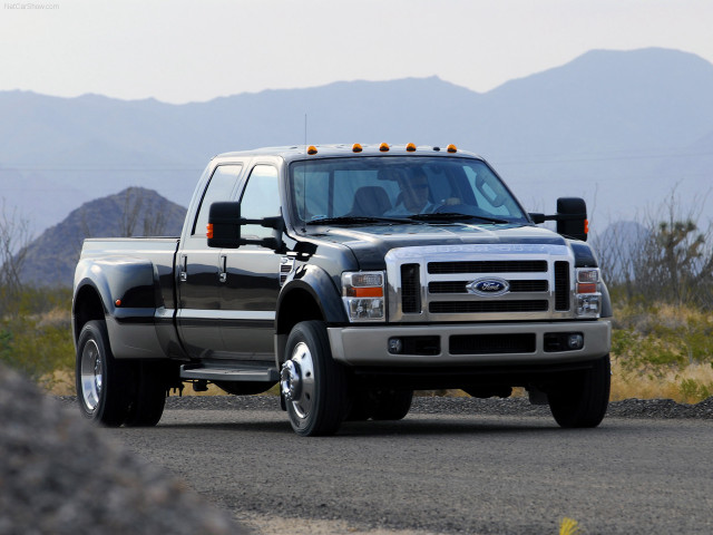 Truck driving road mountains sky free wallpaper for desktop - medium preview image