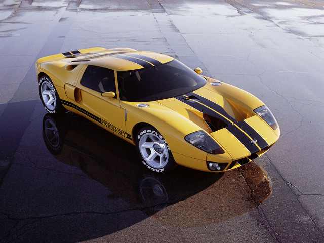 Yellow sports car wet parking free wallpaper for desktop - medium preview image