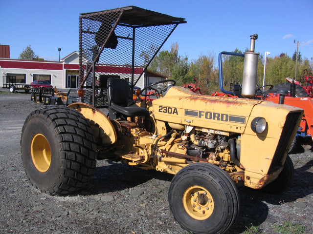 Tractor parked lot building tree free wallpaper for desktop - medium preview image