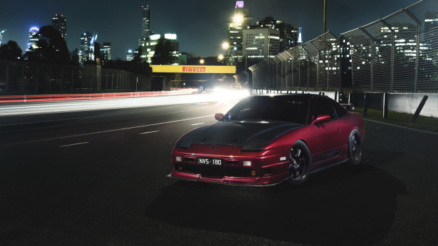 Car city night street skyscraper free wallpaper for desktop - medium preview image