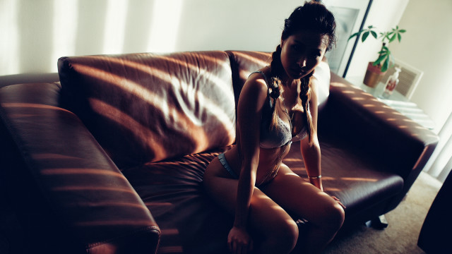 Woman bikini couch livingroom plant free wallpaper for desktop - medium preview image