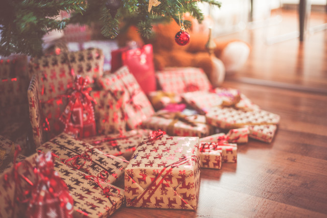 Wrapped presents christmas tree couch free wallpaper for desktop - medium preview image