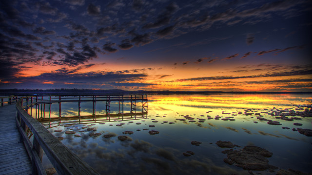Pier sunset clouds water rocks free wallpaper for desktop - medium preview image