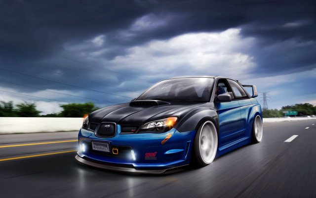 Blue subaru driving cloudy sky free wallpaper for desktop - medium preview image