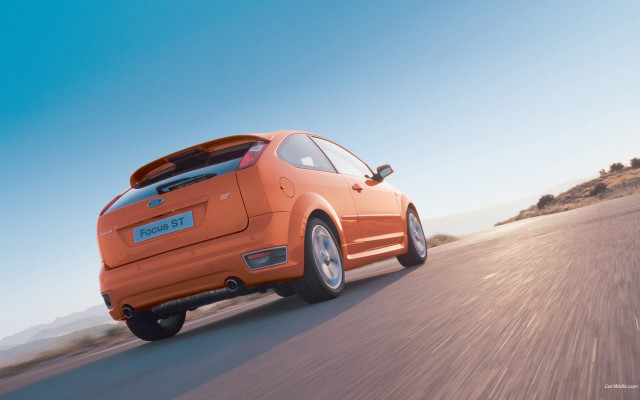 Orange car road hill sky free wallpaper for desktop - medium preview image